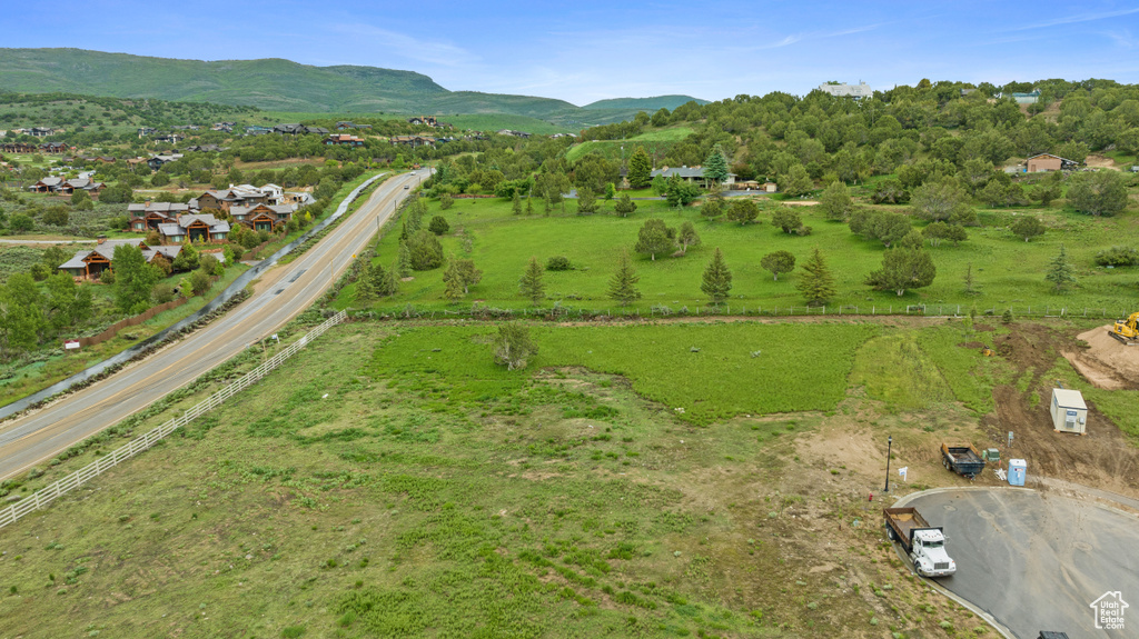 Birds eye view of property featuring a rural view and a mountain view
