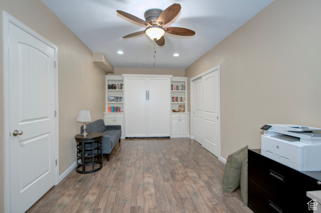 Office featuring ceiling fan and hardwood / wood-style floors