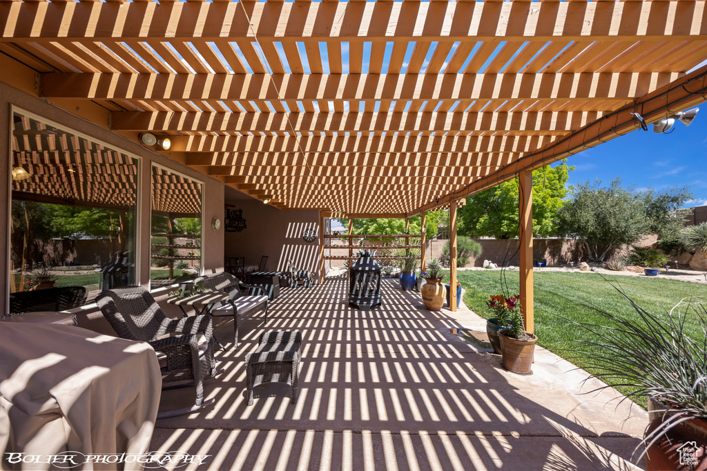 View of patio / terrace with a pergola and an outdoor living space