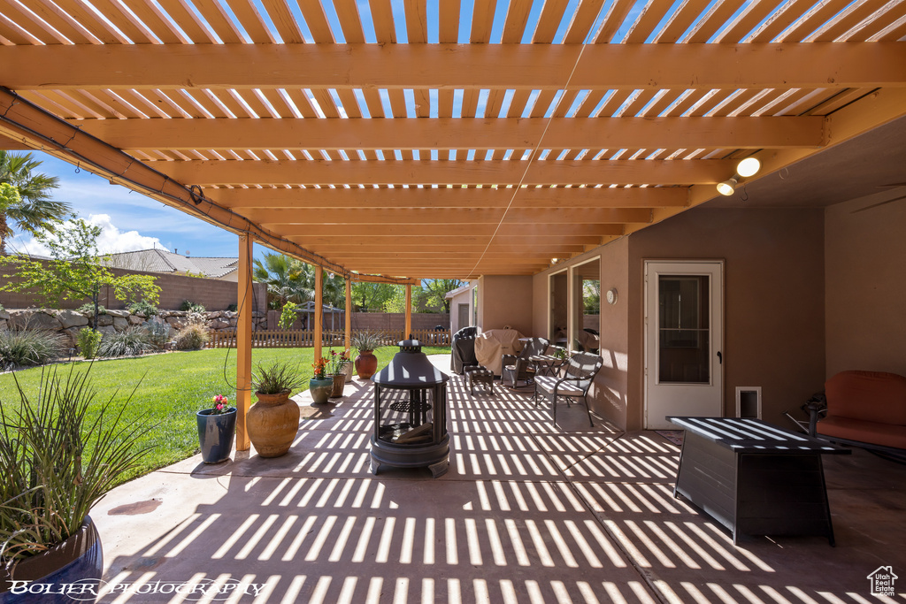 View of patio featuring a pergola