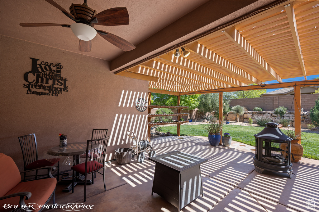 View of patio / terrace with a pergola and ceiling fan