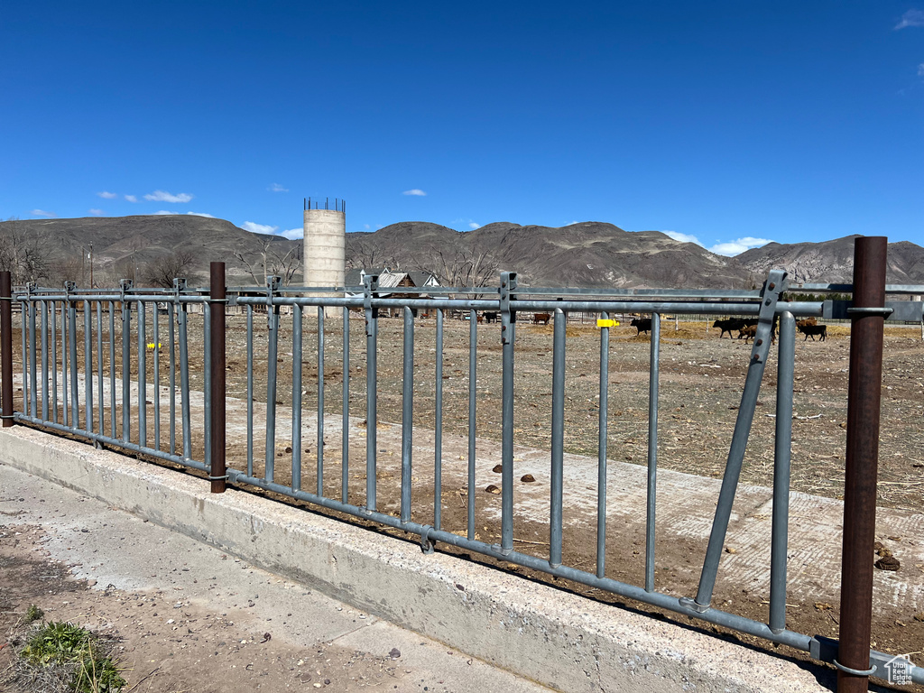 View of gate featuring a mountain view