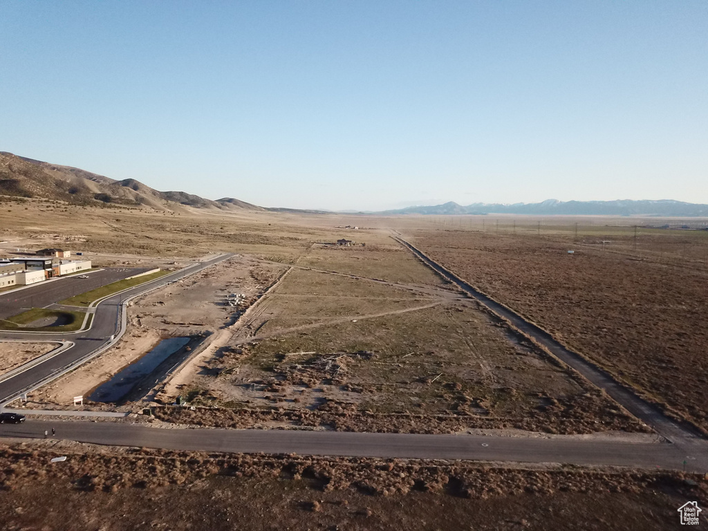 Birds eye view of property with a rural view