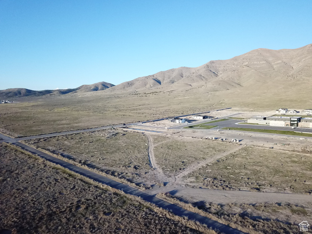 Birds eye view of property with a mountain view