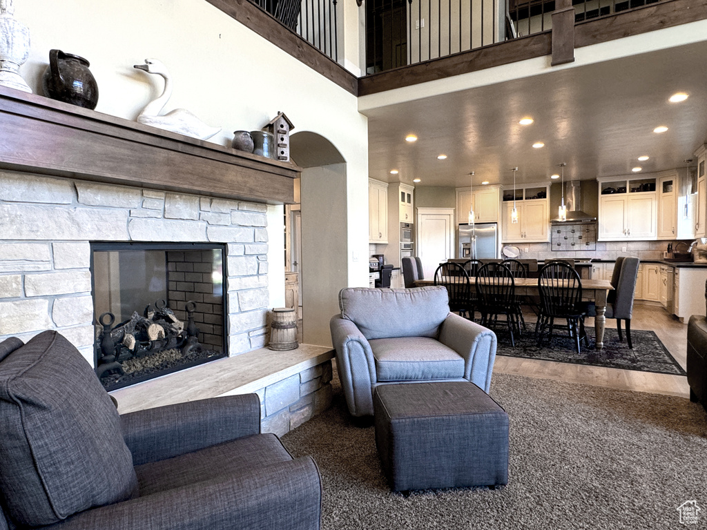 Living room with a stone fireplace