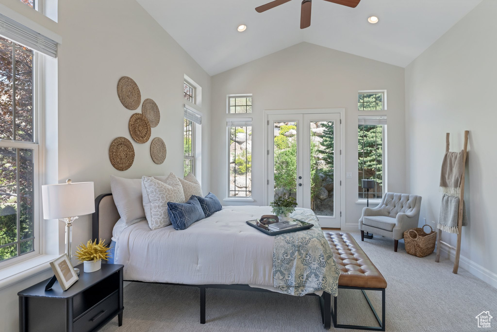Bedroom featuring ceiling fan, carpet, access to outside, and multiple windows