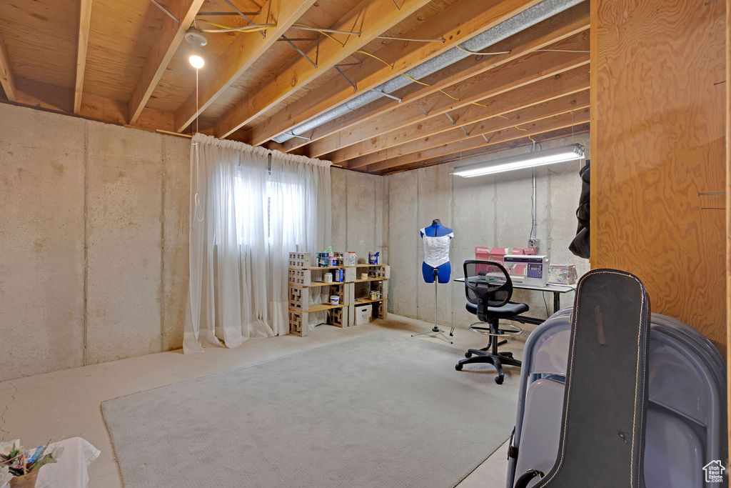 Office area featuring concrete flooring