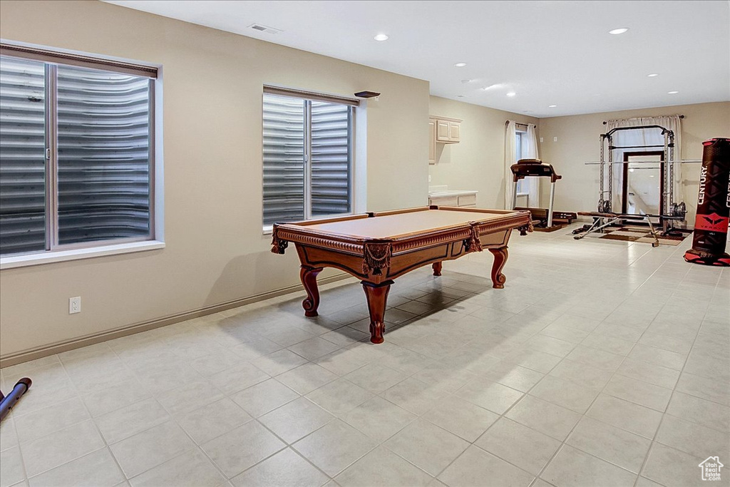 Recreation room featuring light tile floors and billiards