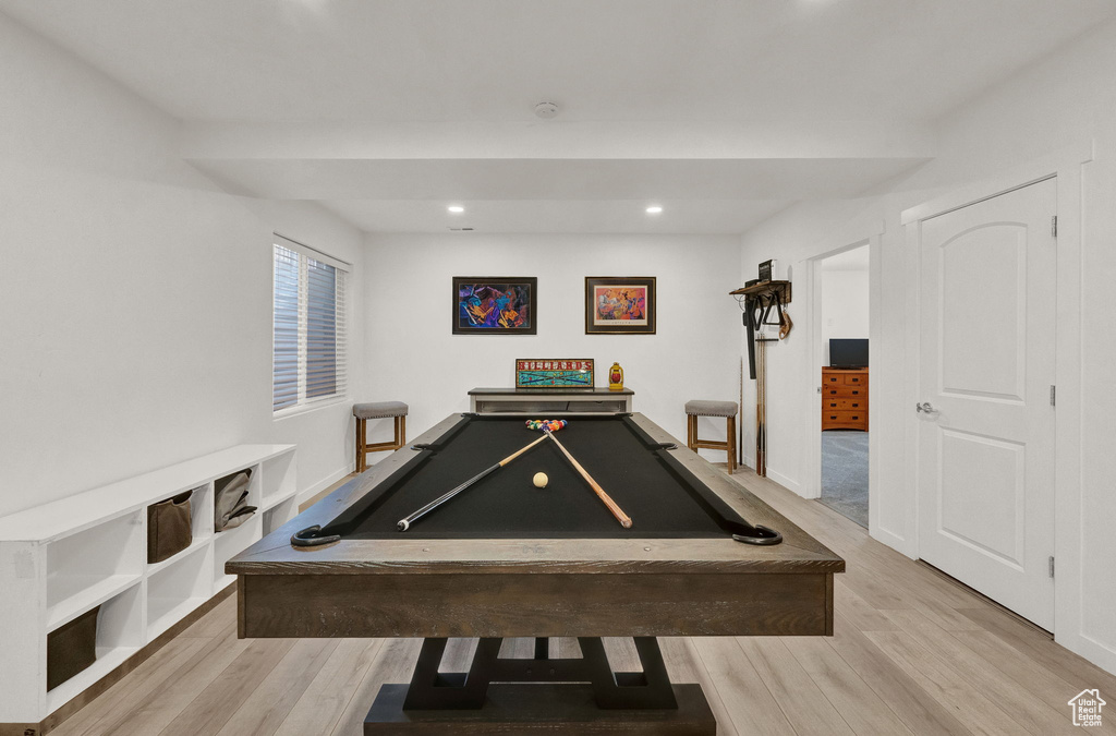Game room featuring pool table and light hardwood / wood-style floors