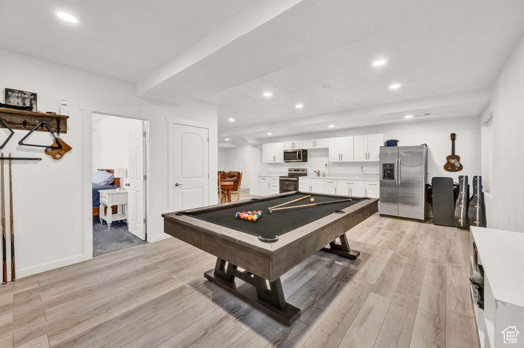 Rec room with pool table and light wood-type flooring