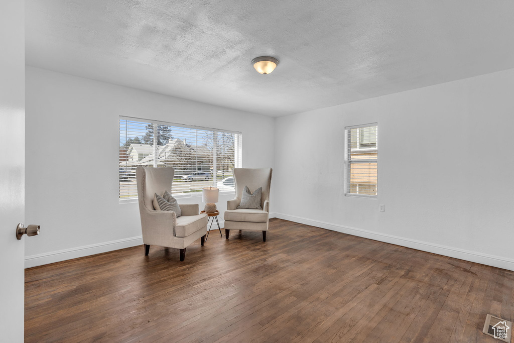 Living area featuring dark hardwood / wood-style floors