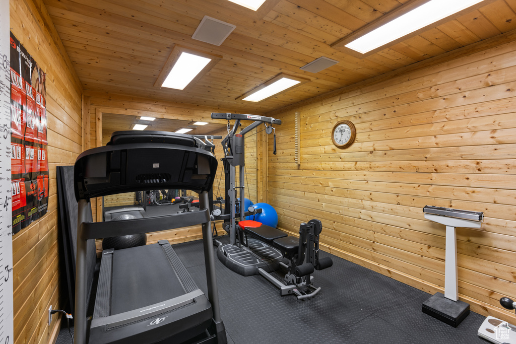 Workout area featuring wooden ceiling
