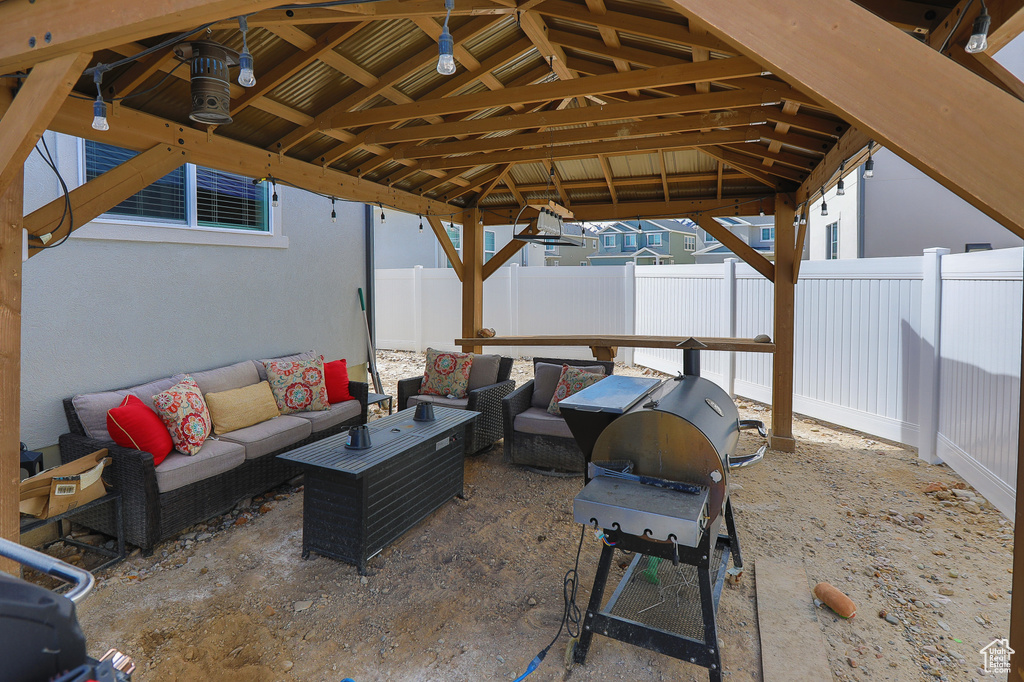 View of patio / terrace featuring a gazebo and an outdoor living space