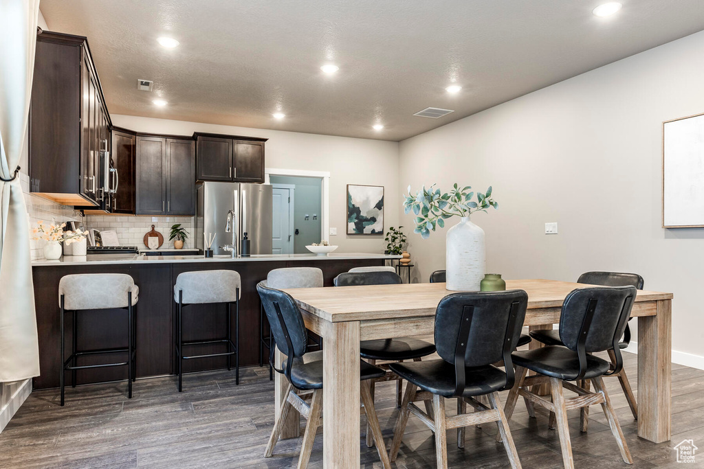 Dining space featuring dark hardwood / wood-style floors