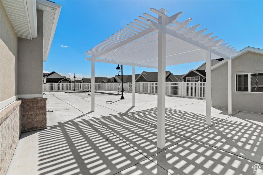 View of patio with a pergola