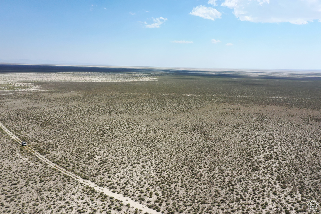 Birds eye view of property with a rural view