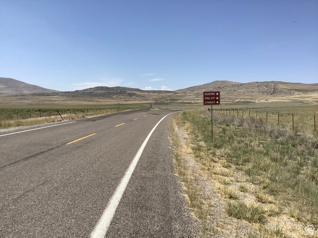 View of road featuring a rural view and a mountain view