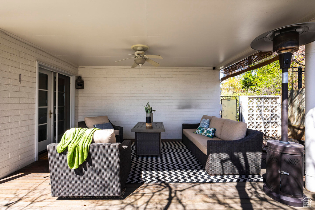 View of patio / terrace featuring an outdoor living space and ceiling fan