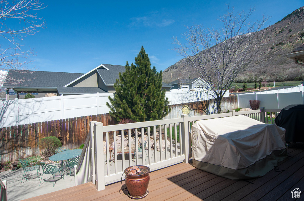 Deck with grilling area and a mountain view