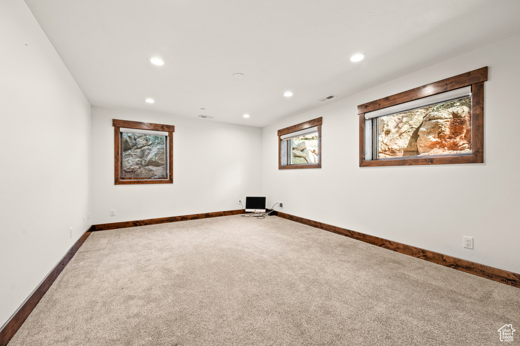 Unfurnished room with carpet floors