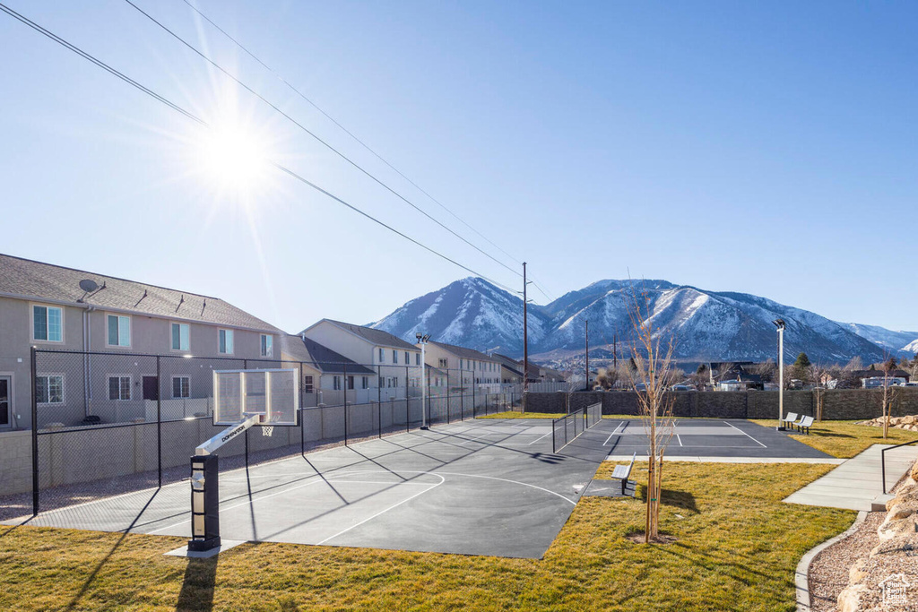 View of home's community featuring basketball court and a mountain view