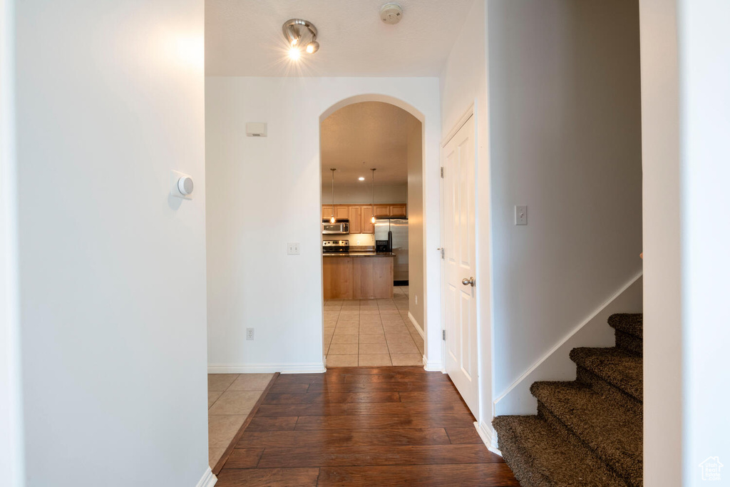 Hall featuring light hardwood / wood-style flooring