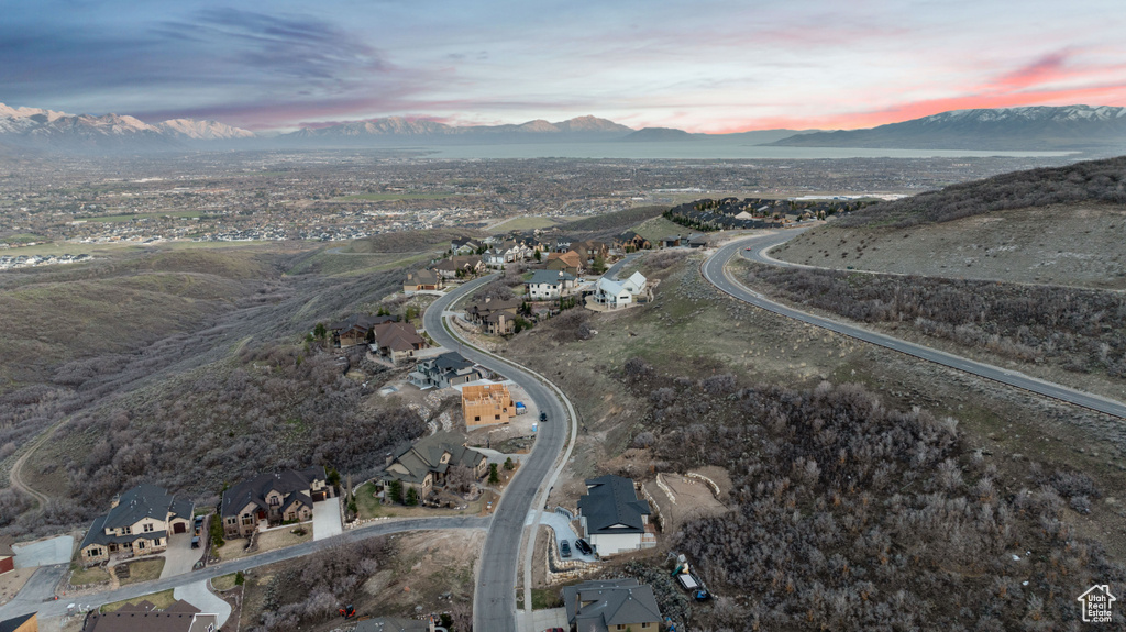 Aerial view at dusk featuring a mountain view