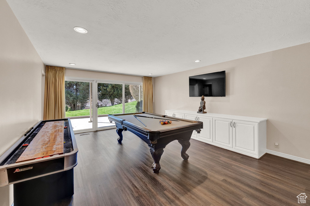 Recreation room featuring dark hardwood / wood-style floors and billiards
