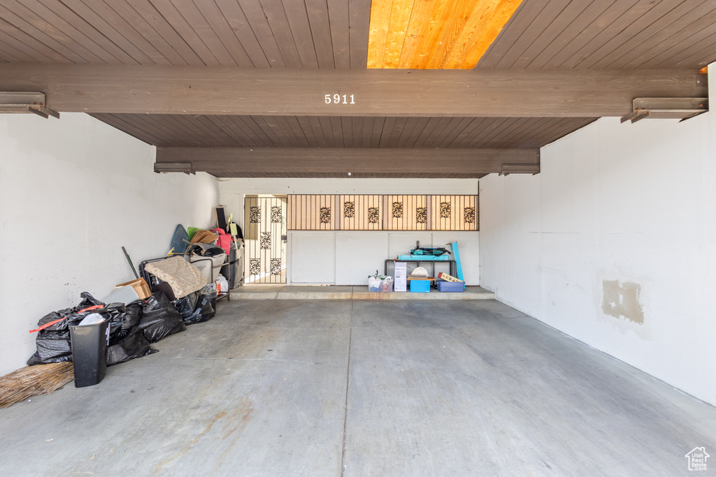 Garage featuring wooden ceiling
