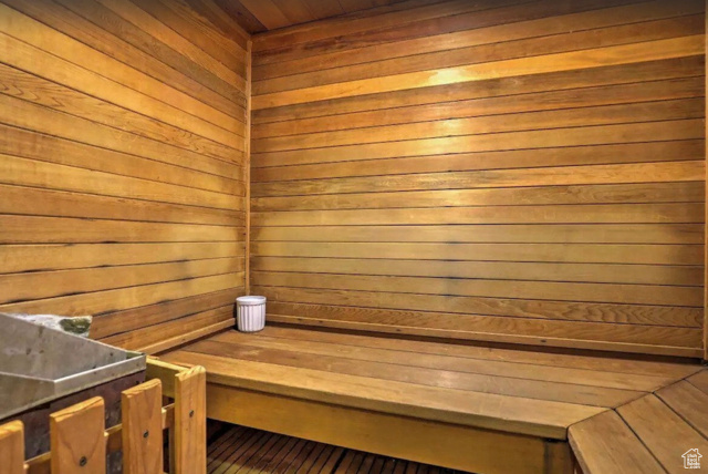 View of sauna / steam room featuring wood walls