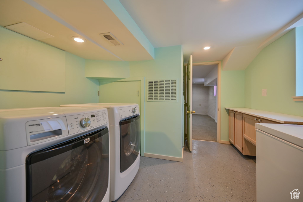 Laundry area with separate washer and dryer