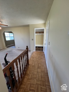 Hallway with parquet flooring