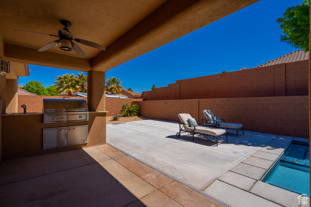 View of terrace with ceiling fan and area for grilling