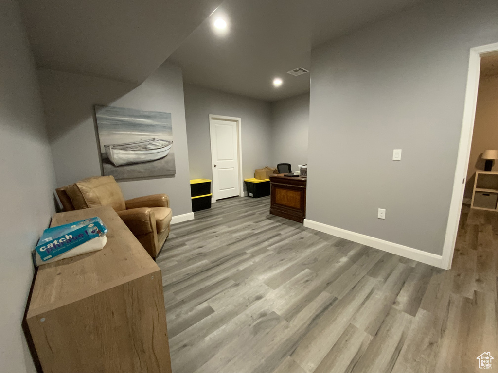 Sitting room featuring hardwood / wood-style floors