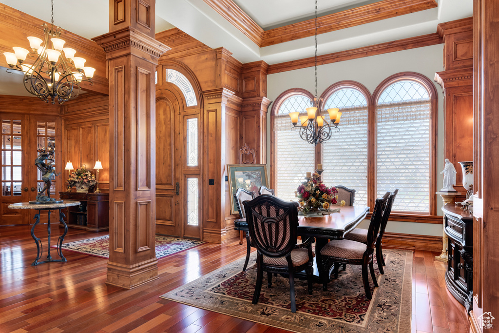 Dining area featuring a wealth of natural light and dark hardwood / wood-style floors