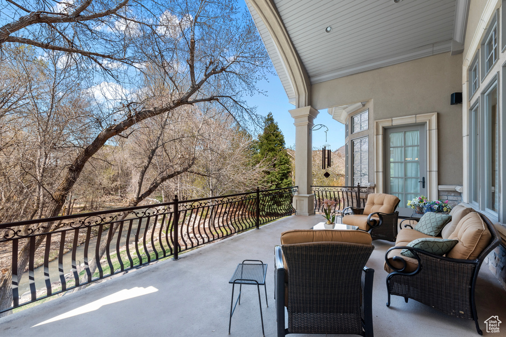 View of patio / terrace featuring an outdoor living space and a balcony