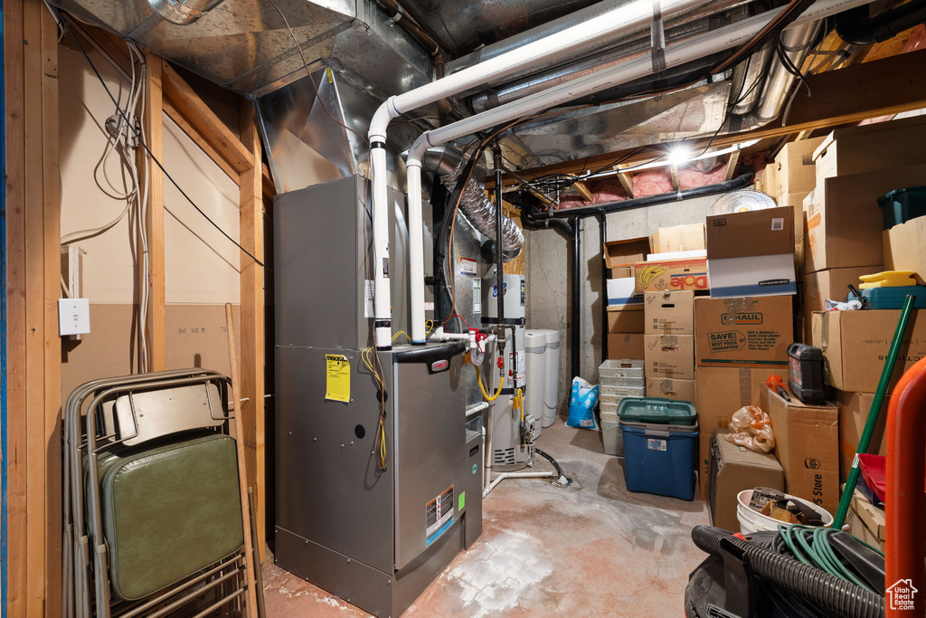 Utility room featuring heating utilities