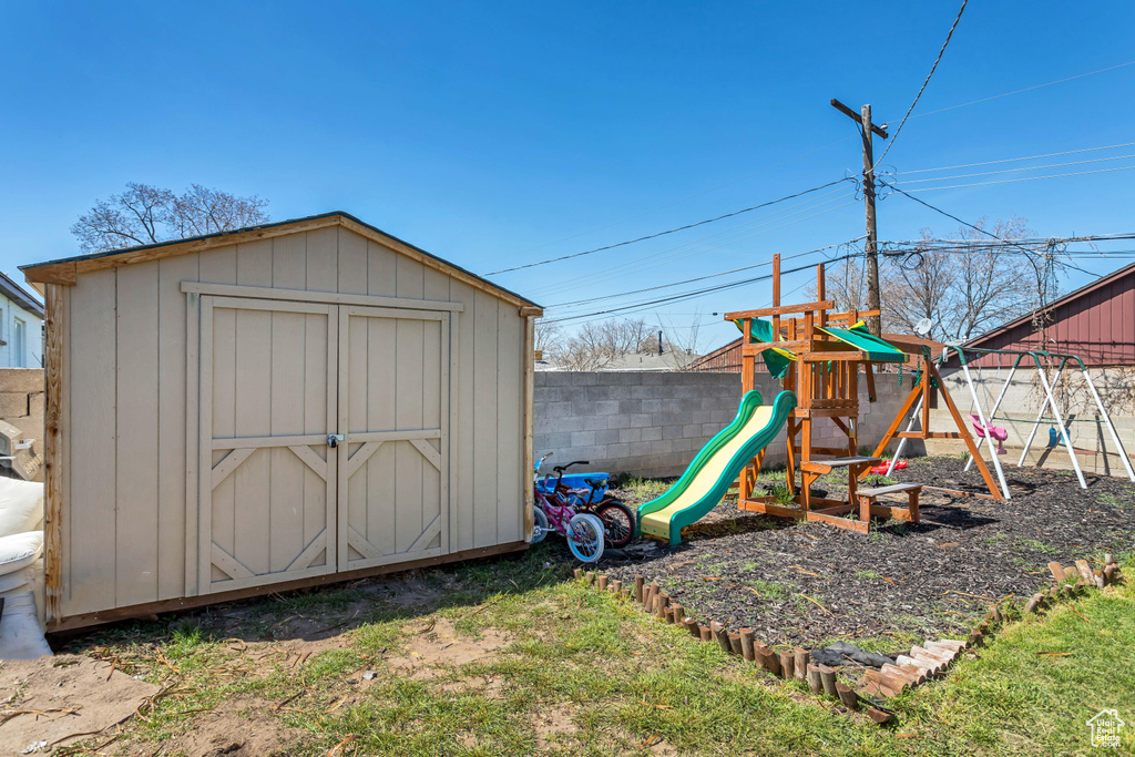 View of play area with a shed