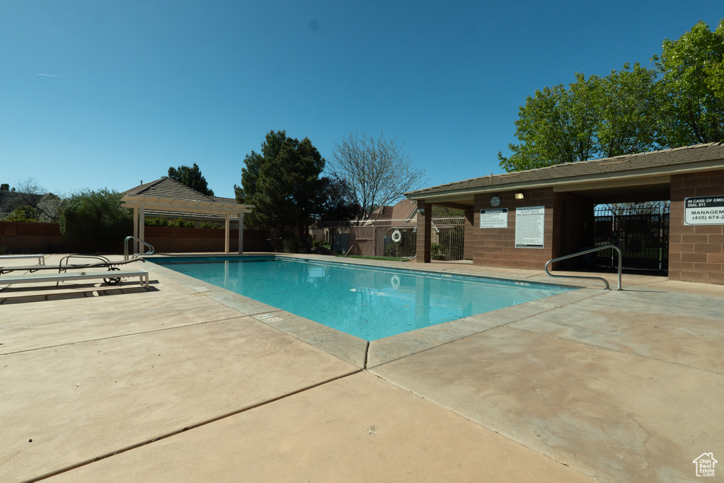 View of pool featuring a patio and a gazebo