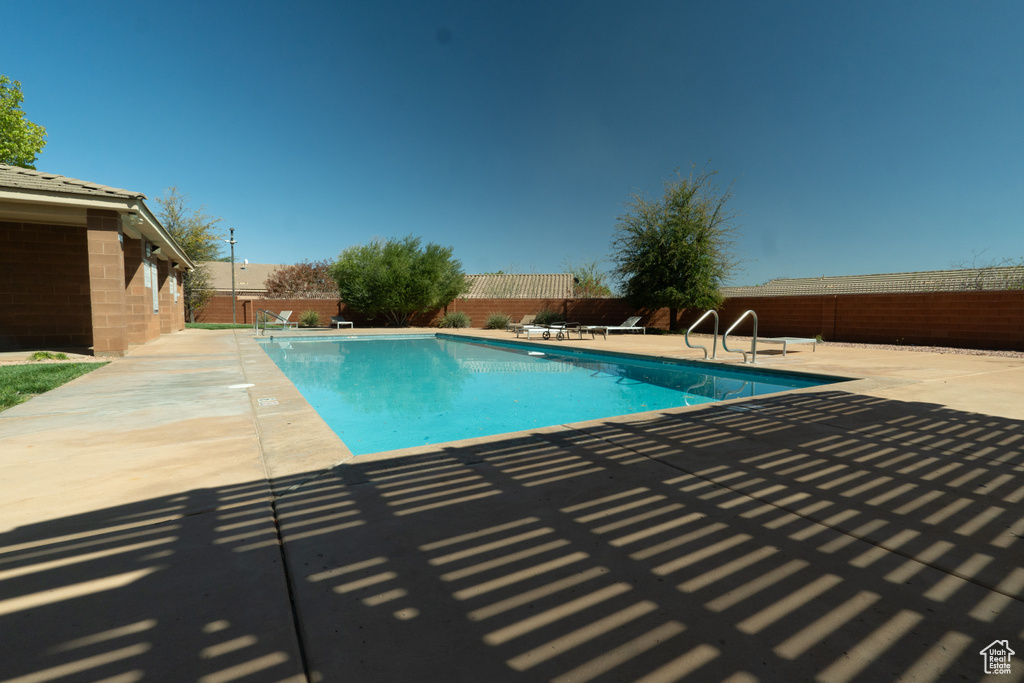View of swimming pool with a patio