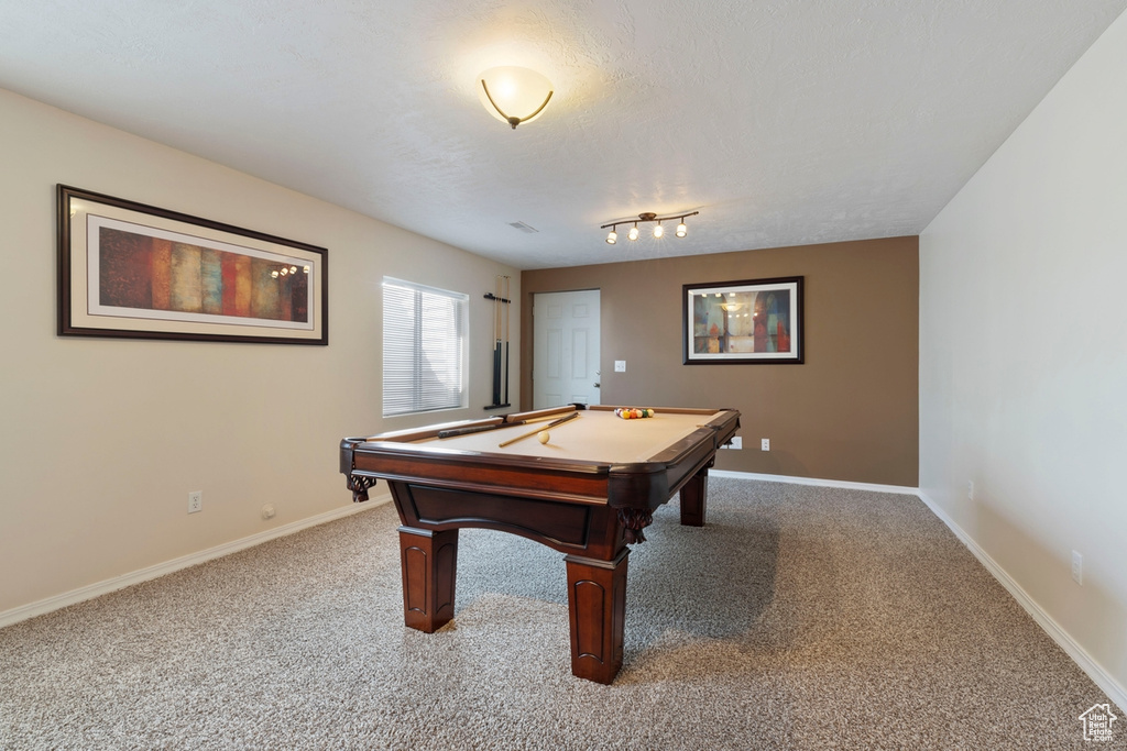 Playroom with carpet flooring, track lighting, billiards, and a textured ceiling