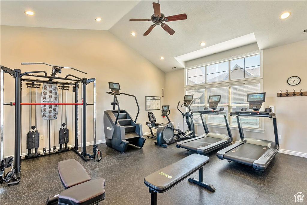 Gym featuring high vaulted ceiling and ceiling fan