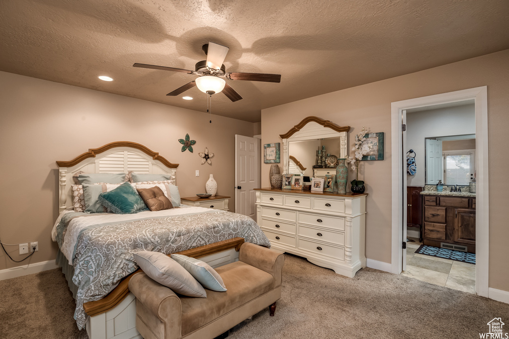 Tiled bedroom with a textured ceiling and ceiling fan