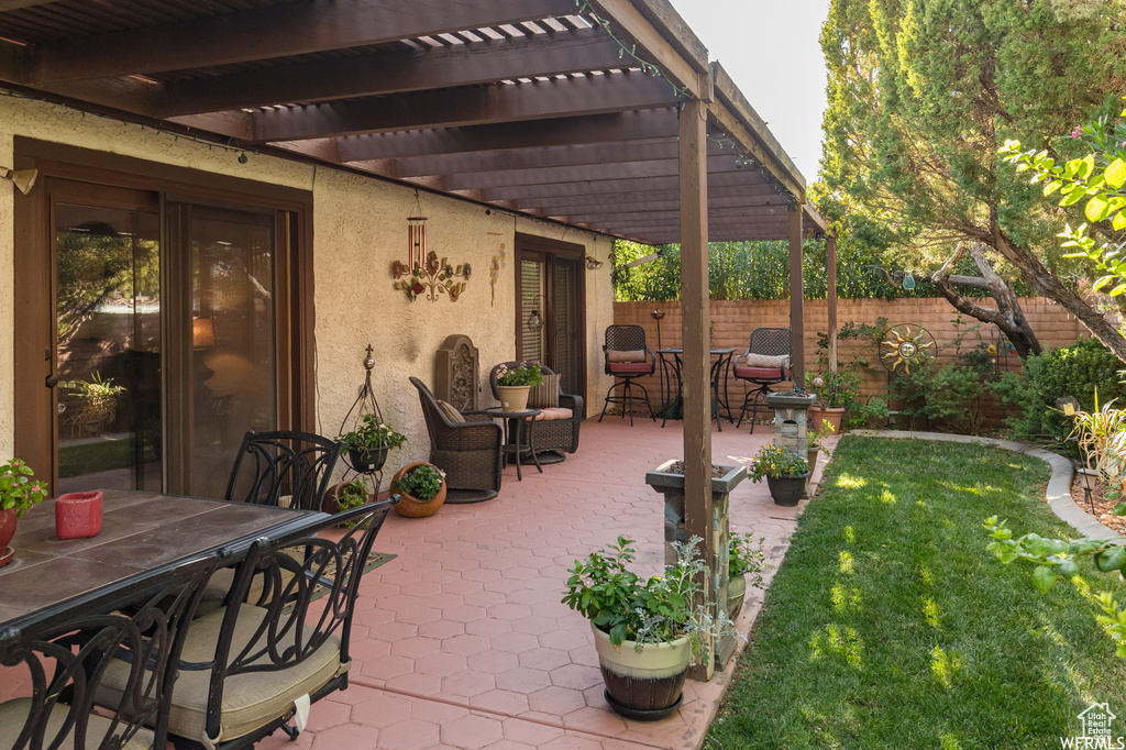 View of patio / terrace with a pergola