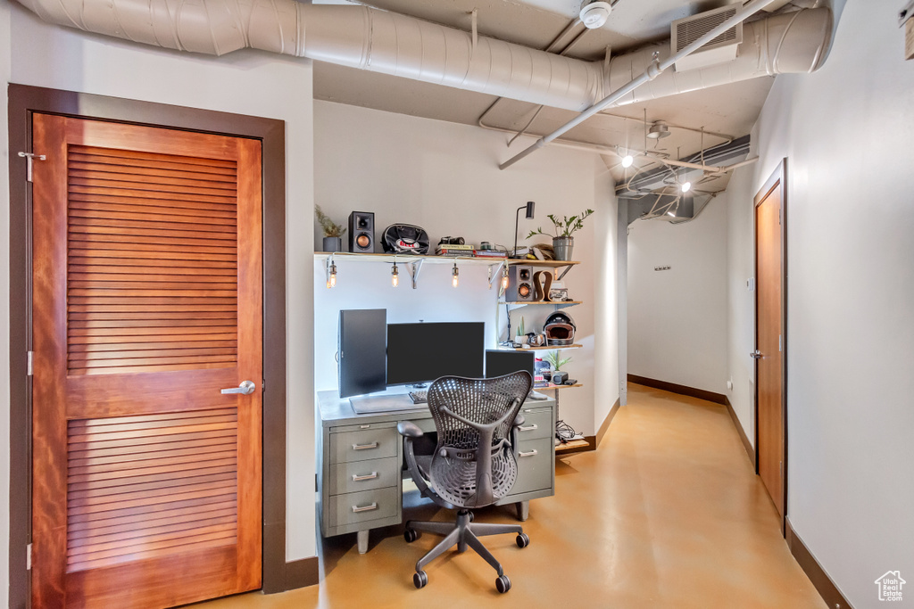 Office space featuring built in desk