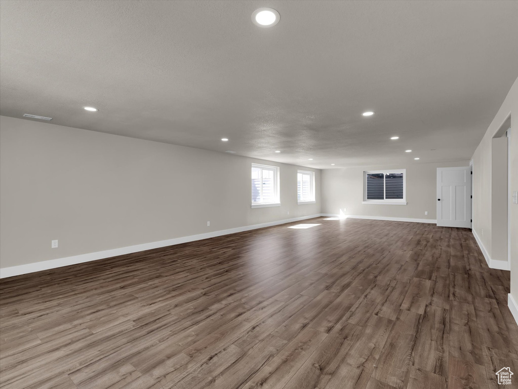 Unfurnished living room with wood-type flooring