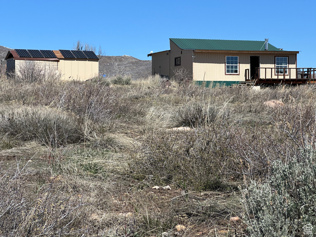 View of yard with a deck