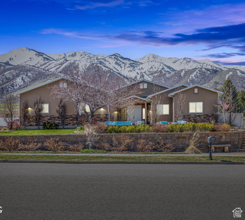 Ranch-style home with a mountain view