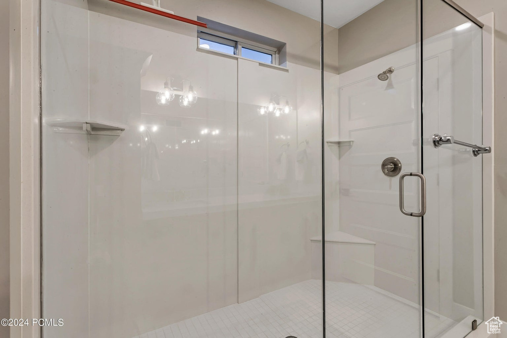 Bathroom featuring a shower with shower door