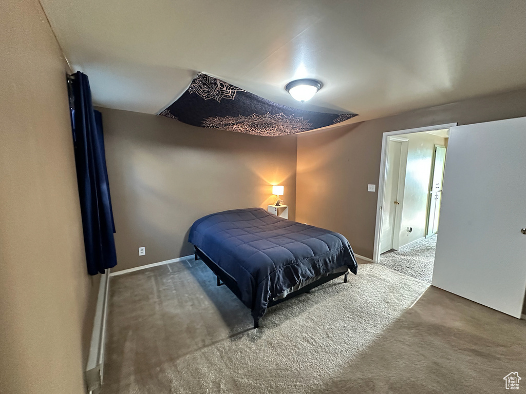 Bedroom featuring carpet flooring